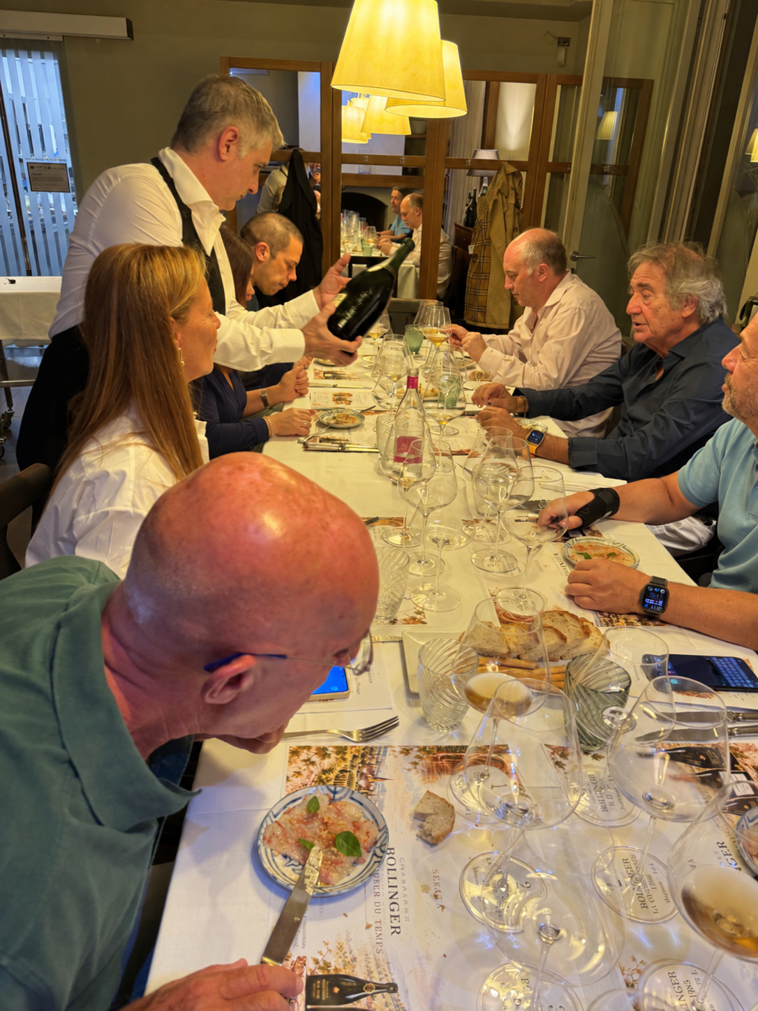 Another view of the bottles being served.