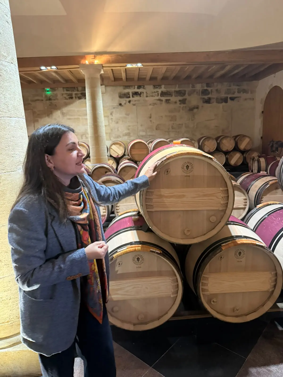 Our guide explaining the barrels at La Mission Haut-Brion