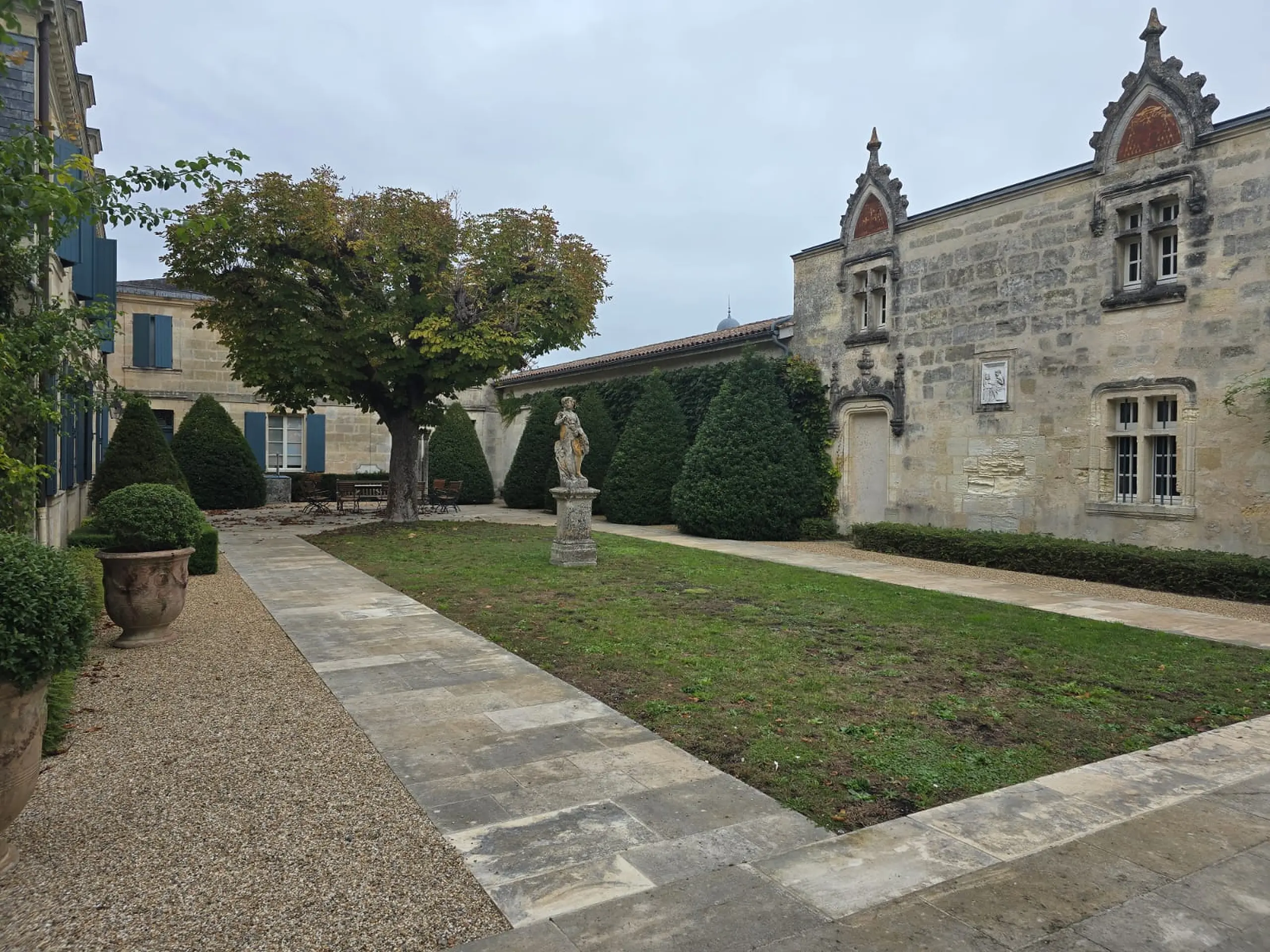 The courtyard and garden of Château La Mission Haut-Brion, the first stop on our journey