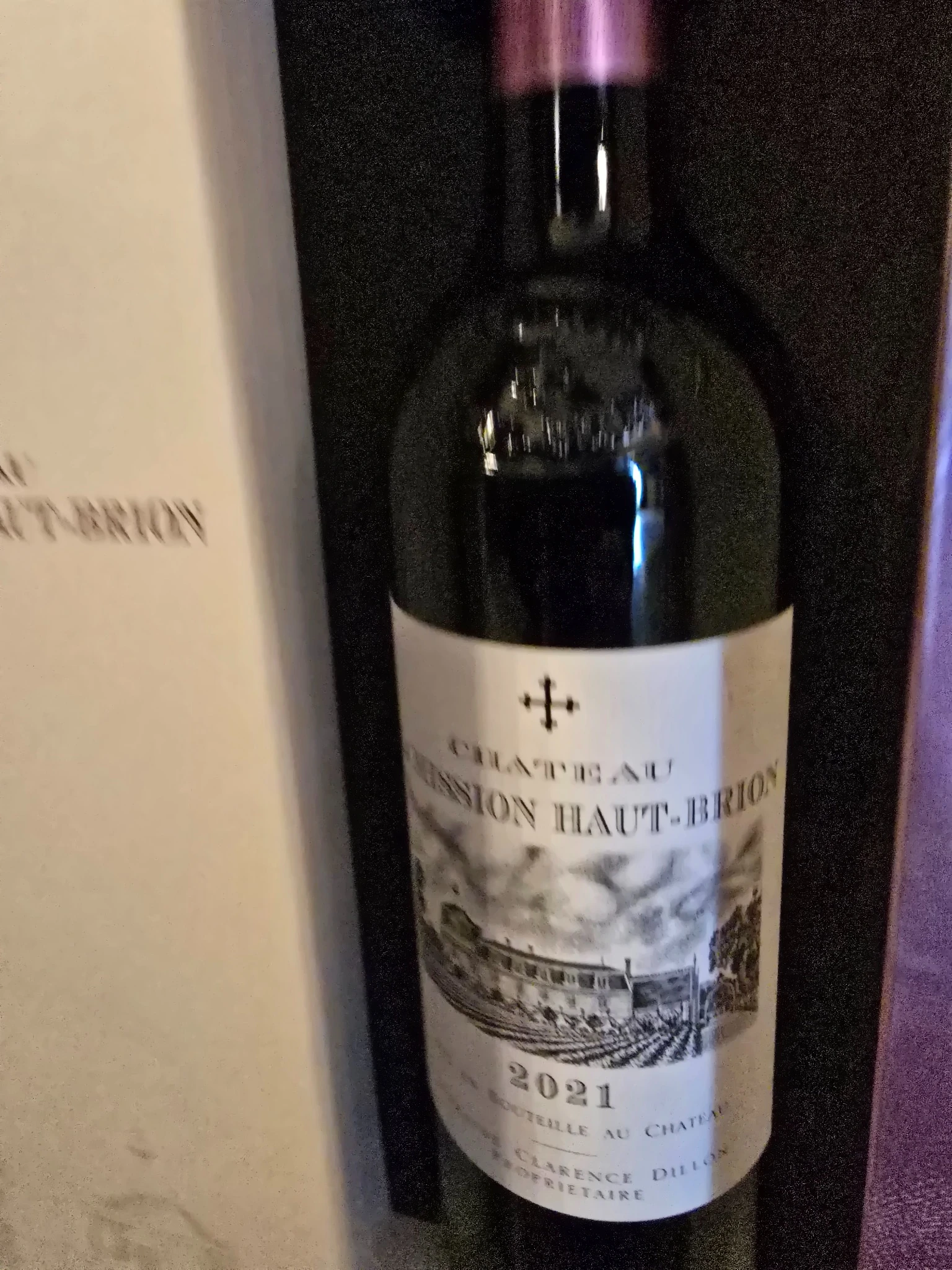 Château La Mission Haut-Brion Rouge 2021 displayed beside its presentation case